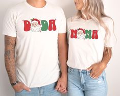 This festive Christmas design can be customized with a name of your choice!  ●PRINT  Our designs are printed using the highest quality professional direct to garment (DTG) process, meaning fabric grade ink is printed directly onto the garment and blends with the fibers. This allows us to achieve a vintage style look on many of our designs, and a feel that is similar to screen printing (which avoids the thick rubbery feeling of vinyl). *Slight variances in color and size are normal compared to wh 1st Birthday Shirts, Family Parties, Christmas Design, Mommy And Me, Birthday Shirts, Sweatshirt Fashion, Sweatshirts Women, 1st Birthday, Gender Neutral