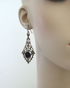 "Vintage Jewelry - Vintage Earrings - Art Nouveau Earrings - Black Stone Earrings - Filigree Earrings - Brass Earrings - handmade jewelry These are such exquisite earrings! Gorgeous long vintage brass intricate lacy earrings embellished with a jet black faceted glass stone. Chloe says, \"Wear them and feel fabulous!\" They measure a stunning 2 1/2\" long from the top of the ear wire. Thanks for visiting Chloe's" Antique Black Pierced Earrings, Victorian Metal Jewelry With Matching Earrings, Antique Black Earrings For Gift, Antique Style Black Earrings For Gift, Black Victorian Pierced Earrings, Victorian Black Pierced Earrings, Formal Metal Plug Earrings, Victorian Jewelry Set With Matching Earrings, Antique Black Drop Earrings