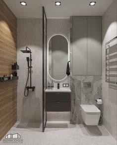 a bathroom with a toilet, sink and mirror in it's center wall next to a walk - in shower