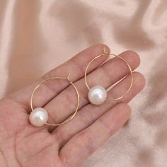 Type:    PEARL LARGE HOOP EARRINGS Feature:  30mm Hoops with Large Round 11-12mm Freshwater Round Pearls Pearl color:Natural white Pearl size:11-12mm  Pearl shape:Round Pearl luster: Very high Pearl blemish: 85% free Material:   14K Gold Plated on Brass Please Note: Due to the variance of the natural pearls, size measurement is approximate, and color may vary a little. Pearl White Hoop Earrings For Wedding, Hypoallergenic Round Pearl Earrings For Party, Hypoallergenic Hoop Earrings For Weddings, Nickel-free White Hoop Pearl Earrings, White Hoop Bridal Earrings, Hypoallergenic Round Pearl White Jewelry, Pearl White Hypoallergenic Jewelry, Nickel-free Pearl White Round Jewelry, Nickel Free Pearl White Jewelry