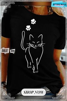 a woman wearing a black shirt with a white cat on it