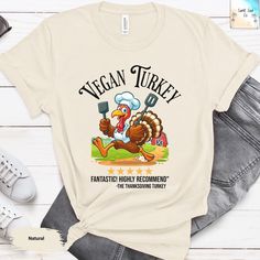 Get ready to celebrate the holiday season with our adorable Thanksgiving shirt, perfect for both the first Thanksgiving and all your festive gatherings. This stylish and comfortable Thanksgiving outfit is ideal for family get-togethers, as well as for boys and girls who want to join in the fun. With a cute fall shirt featuring festive designs, it's a great Thanksgiving gift for friends and family alike. Show off your gratitude and spirit for Turkey Day with this thankful shirt that everyone will love to wear. Make your Thanksgiving celebration even more special by adding this charming piece to your festive wardrobe! ---- How To Order ----- 1-) Please, check and review all the photos. 2-) Choose your t-shirt size and color. 3-) Click add to cart. You can go back to add more shirts. 4-)Click Friendsgiving Shirt, The First Thanksgiving, Cute Fall Shirt, Funny Thanksgiving Shirts, Thankful Shirt, First Thanksgiving, Thanksgiving Celebration, Thanksgiving Shirt, Funny Thanksgiving