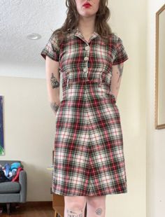 Beautiful! Vintage 1950's Wool Plaid Dress  Large Sparkly Buttons Side zipper  Adult XS  In good vintage condition  Has a couple of holes~ all shown in the photos  One repair on the back seam~  No tag  Measurements taken with dress laid flat  40" long  13.5" waist  17" armpit to armpit  16.5" shoulder to shoulder  💚Please review measurements before purchasing~ vintage tag sizes differ from modern sizes  Happy to answer any questions No refunds  Thank you! I will be reusing materials to pack and Retro Plaid Fitted Vintage Dress, Fitted Plaid Retro Vintage Dress, Fitted Retro Plaid Vintage Dress, Fitted Short Sleeve Rockabilly Vintage Dress, Fitted Plaid Vintage Dress, Casual Vintage Dress With Short Sleeves, Etiquette Vintage, Boys Plaid, Brown Floral