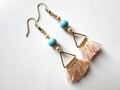 Peach turquoise tassel earrings, dangle earrings Pretty earrings featuring peach tassels with gold accent triangle, handwired to Prestige turquoise pearls and Prestige rose peach pearls, they all dangle on quality gold earwires. EARRINGS measure almost 2.5 Earrings Collection https://www.etsy.com/shop/minieglamstudio?section_id=7077498 Thanks for stopping by! If you need custom order, feel free to contact Minie Glam Studio. Have a nice day! :) Summer Dangle Tassel Earrings, Summer Tassel Dangle Earrings, Summer Tassel Dangle Earrings With Latkans, Summer Latkans Tassel Dangle Earrings, Summer Latkan Tassel Dangle Earrings, Pink Tassel Drop Earrings, Adjustable Pink Tassel Drop Earrings, Bohemian Triangle Adjustable Earrings, Bohemian Adjustable Triangle Earrings