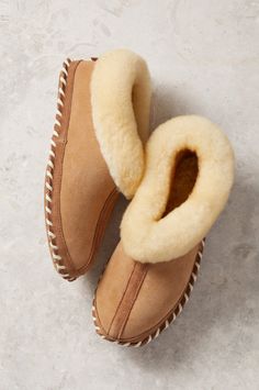 click to expand Comfortable Sheepskin Winter Slippers, Cozy Leather Slippers With Suede Lining, Comfortable Sheepskin Slippers With Leather Sole, Sheepskin Slippers With Rubber Sole And Round Toe, Cozy Sheepskin Slippers For Indoor Use, Cozy Sheepskin Indoor Slippers, Comfortable Shearling Slippers With Leather Sole, Cozy Leather Slippers With Cushioned Footbed, Winter Sheepskin Slip-on Slippers