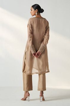 Beige and brown full sleeves kurta with bloom embroidery on the neckline and sleeves hem. Paired with a pant and a shimmery striped bustier. - Aza Fashions Beige Long Sleeve Sets With Embroidered Border, Brown Sets With Resham Embroidery And Long Sleeves, Brown Long Sleeve Sets With Resham Embroidery, Elegant Long Sleeve Brown Kurta, Brown Long Sleeve Kurta With Chikankari Embroidery, Beige Embroidered Long Sleeve Kurta, Elegant Embroidered Brown Kurta, Bloom Embroidery, Organza Embroidery