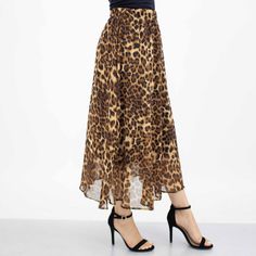 Sheer a-line leopard print midi skirt with elastic waist and black inner skirt. Nice for evenings out, lunch dates or office wear. Sizes: SM - XL Material: 100% polyester Care: Machine wash with cold water Leopard Print Long Skirt For Spring, High Waist Leopard Print Skirt For Fall, Long Leopard Print Skirt For Spring, Elegant Leopard Print Skirt, Trendy High Waist Leopard Print Skirt, Leopard Print Lined Skirt For Night Out, Leopard Print Skirt For Fall Party, Spring Leopard Print Midi Skirt, Fall Leopard Print Skirt For Party