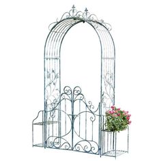 a metal plant stand with flowers in it