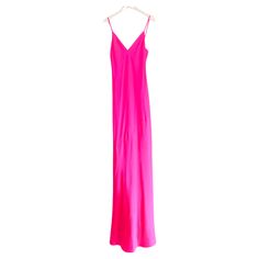 Stunning L’Agence Serita silk maxi slip dress. Bought for £575 and unworn. Made from glossy, soft fluo bright hot pink silk, it has a super flattering bias cut with diagonal seaming, delicate spaghetti straps and shaped cups. Fully lined. Size US4/UK8 - bias cut allows a lot of give in the fit so it should fit larger too. Measures approx - bust 32”, waist 32”, hips 38” and length 62”. Pink Silk V-neck Party Dress, Pink V-neck Silk Party Dress, Pink Satin Silk Dress With Bias Cut, Sleek Pink Dress For Party, Spring Pink Slip Dress With Bias Cut, Pink Fitted Silk Slip Dress, Fitted Silk Slip Dress In Pink, Pink Spring Slip Dress With Bias Cut, Spring Pink Bias Cut Slip Dress