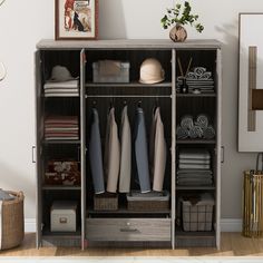 an organized closet with clothes and other items