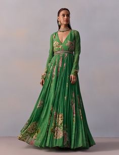 Featuring the Arsheen anarkali, crafted from luxurious georgette fabric in a striking green hue, this outfit is enhanced with churidaar sleeves and styled with an embroidered belt for a touch of sophistication. Perfect for your glam party look, it ensures you make a memorable impression at any event. Airline Frock Design Pakistani, Airline Frock Design, Anarkali Bridal, Lehenga Style Saree, Designer Mirror, Green Anarkali, Hanuman Wallpapers, Indian Anarkali, Gown With Dupatta