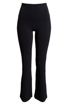 These subtly flared leggings boast signature moisture-wicking tech to keep you moving comfortably. 32" inseam, 19" leg opening; 9 1/2" front rise; 13" back rise (size Medium) Elastic waist Dri-FIT moisture-wicking technology 63% nylon, 37% spandex Machine wash, line dry Imported Nike Fitted Functional Leggings, Nike Functional Fitted Leggings, Moisture-wicking Fitted Wide Leg Yoga Pants, Fitted Wide Leg Moisture-wicking Yoga Pants, Moisture-wicking Fitted Wide-leg Yoga Pants, Black Mid-rise 4-way Stretch Yoga Pants, Black Flare Activewear For Workout, Stretch Activewear With Straight Leg, Functional Stretch Activewear With Straight Leg