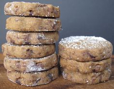 a stack of cookies sitting on top of a wooden table