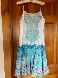 "I LOVE the colors in this Vintage Liz Claiborne slip dress. The top was a camisole before I sewed this sweet ruffled skirt on the bottom. The appliqué is also vintage (Circa early 1980's) and hand died to match the skirt. It is a size medium. Bust measures 40\" around. The waist is also 40\" around. The length is 37 inches from the armpit to the skirt bottom. There are also adjustable silk straps. This is a must have for spring and summer!" Beach Camisole Dress With Ruffles, Skirted Dress With Ruffle Hem For Brunch, Ruffle Hem Dress For Brunch, Spring Camisole Dress With Ruffles, Camisole Dress With Ruffles For Spring, Summer Tiered Skirt Dress With Lace Patchwork, Summer Dresses With Lace Patchwork And Tiered Skirt, Vacation Dress With Lace Trim And Tiered Skirt, Spring Camisole Dress With Lace Trim