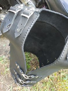 a close up of a motorcycle seat on the ground