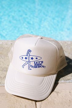 Get beach-ready with our 'Let's Ride, Cowboy' hat! Printed on a tan foam trucker in royal text. Perfect for sunny days by the shore, it's your go-to for chill vibes and fun times under the sun. I do not accept returns or exchanges! I am not responsible for missing/stolen packages please contact your local post office. If your item comes damaged please message me!  If you need to rush your order please message me to make sure I am able to fulfill the order in the desired timeframe. You are responsible to update your shipping method in the checkout.  For wholesale inquires please message me! Light Blue Trucker Hat, Cream 5-panel Summer Hat, Beige Adjustable Trucker Hat For Outdoor, Adjustable Beige Trucker Hat For Outdoor, Beige Trucker Hat With Curved Brim For Outdoor, Beach Trucker Hat With Flat Brim, Trucker Cap For Beach, Retro Beige Hats For Outdoor, Retro Beige Hat For Outdoor