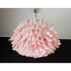 a pink chandelier hanging from the ceiling