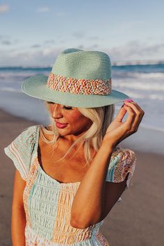 - Stay photoshoot cute with this adorable hat! - Woven material - A multi colored woven band - Hat Dimensions: - Length- 13.5 Inches - Width- 13.5 Inches - Height- 4.5 Inches - Cranial Circumference- 22 Inches - Brim Width- 3 Inches Turquoise Summer Vacation Hat, Bohemian Straw Hat With Upf 50+, Beachy Woven Brimmed Hat, Bohemian Bucket Hat With Upf 50+ For Beach, Handwoven Straw Hat For Vacation, Beach Season, Raffia Hat, Hat Band, Mint, Hats