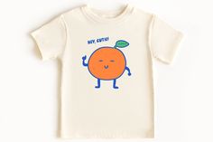 Our tees are made using the highest quality cotton for a soft touch that is super comfortable from first wear! With fun and whimsical graphics, our shirts are the perfect base layer for your kids stylish wardrobe. Fabric Breakdown: 100% Airlume combed and ring-spun cotton Sustainability:  100% No Sweatshops and Eco- friendly. W.R.A.P certified Features:  Side seamed. Retail fit. Unisex sizing. Care Instructions: Turn Inside Out Machine Wash Cold Using Gentle Cycle Do Not Bleach / Fabric Softener Dry Flat. Do not Dry Clean Do Not Iron On Print   Notes: Colors Will Vary Slightly Due to Lighting And/Or Monitor Settings Listing is only for the shirt other products seen in photos are for styling purposes only Sizing: See Photos for Size Chart Thank You For Supporting Our Small Business!See more Playful Organic Cotton Graphic T-shirt, Cute Organic Cotton Crew Neck T-shirt, Cute Cartoon Print Crew Neck T-shirt, Playful Unisex T-shirt With Character Print, Kawaii Cotton T-shirt With Cartoon Print, Cute Crew Neck T-shirt With Cartoon Print, Cute Short Sleeve T-shirt With Screen Print, Cute Cotton T-shirt With Cartoon Print, Fun Character Print T-shirt