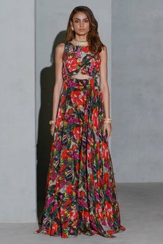 Multi color gown with abstract gardenia floral print, accentuated with sequin embellishments.
Components: 1
Pattern: Print
Type Of Work: Floral
Neckline: Round Neck
Sleeve Type: Sleeveless
Fabric: Crepe
Color: Multi Color
Other Details: 
Front cut-out detailing
Occasion: Resort - Aza Fashions