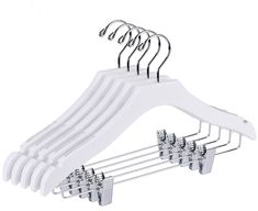 a set of six white hangers with five clips on each end and one bar in the middle