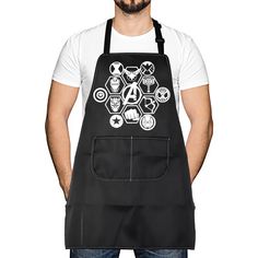 a man wearing an apron with the avengers symbol on it, standing in front of a white background