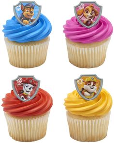 paw patrol cupcakes with frosting on them are shown in four different colors