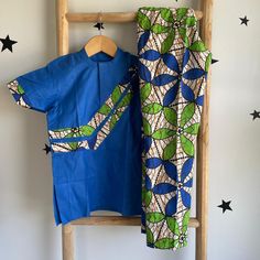 Set for Boys, Handmade in Nigeria.  Stand out from the crowd and express your individuality with a one-of-a-kind African print design. Find a style that reflects your personality, from bold and beautiful dresses to classic shirts and pants. Your purchase empowers the talented artisans of Abia State and helps preserve this special cultural tradition. Bring a touch of African vibrancy and cultural richness to your wardrobe. Order your handmade African print clothing today! Please note: Due to the Blue Cotton Sets With Graphic Print, Blue Cotton Set With Graphic Print, Green Graphic Print Summer Sets, Blue Casual Fitted Sets, Casual Blue Fitted Sets, Blue Fitted Casual Sets, Green Summer Set With Graphic Print, Summer Green Sets With Graphic Print, Cotton Short Sleeve Matching Pant Set