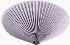 a purple fan is hanging from the ceiling