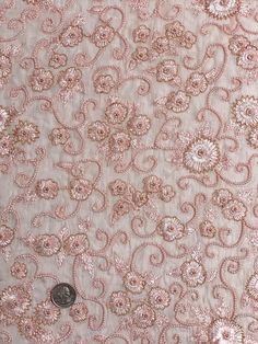 Distinguished by its luxurious design, this high-quality Pink Sequin & Beads On Silk Chiffon JEC-030-2 Fabric is perfect for women's high-end evening dresses, costumes, jackets, and skirts. Our unique and distinctive fabric is available in a wide selection of colors. The fabric is sold by the Yard, and measures 44 inches in width. Elegant Embellished Embroidered Fabric, Elegant Festive Pearl Embroidered Fabric, Elegant Embellished Embroidered Fabric For Festive Season, Elegant Formal Embroidered Fabric With Intricate Embroidery, Elegant Fitted Embroidered Fabric For Festive Occasions, Elegant Embroidered Fabric With Pearl Embroidery For Reception, Elegant Pearl Embroidered Fabric For Reception, Festive Formal Embroidered Fabric With Sequins, Elegant Embroidered Fabric For Festive Party