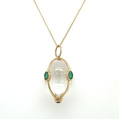 14kt yellow gold quartz egg with four oval emeralds. Chain sold separately. Luxury Bohemian Oval Jewelry, Luxury 22k Gold Oval Jewelry, Luxury Contemporary Oval Jewelry, Contemporary Luxury Oval Jewelry, Luxury Bohemian Oval Gemstones, Luxury Oval Fine Jewelry Gemstones, Luxury Hammered Oval Pendant Jewelry, Luxury Traditional Oval Jewelry, Luxury 14k Gold Oval Emerald Necklace