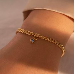 "This bracelet features a bold chain design plated in gold, adding a touch of sophistication to her wrist. The birthstone charm represents her birth month, making it a truly unique and meaningful gift.  #YOU MAY LIKE THIS silver bar cotton bracelet https://www.etsy.com/listing/1492776594/silver-bar-cotton-bracelet-best-gift Mother of Pearl Silver Bracelet https://www.etsy.com/listing/1489394780/mother-of-pearl-silver-bracelet-pearl # HOW TO ORDER 1. Choose the Birth Stone 2. Choose the Font of c Trendy Charm Bracelet With Delicate Chain As Gift, Gold Bracelets For May Birthstone, Trendy Delicate Chain Bracelet Gift, Trendy Delicate Chain Bracelet As Gift, Trendy Gold Chain Charm Bracelet As Gift, Trendy Gold Plated Charm Bracelet With Adjustable Chain, Trendy Gold Bracelet With Delicate Chain For Gift, Gold Plated Chain Bracelet For Her, Trendy Tarnish Resistant Gold Bracelet As Gift