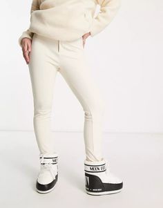 South Beach ski stirrup pants in cream | ASOS Winter White Stretch Pants, Cream Stretch Pants For Winter, Stretch Cream Pants For Winter, Chic White Winter Pants, Chic White Winter Bottoms, Chic White Bottoms For Winter, White Skiing Bottoms For Winter, Sporty Fitted Pants For Winter Sports, Fitted Winter Skiing Pants