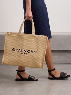 Woven from durable yet lightweight raffia, Givenchy's tote is perfect for trips to the beach. It's embroidered with the label's logo in black threads the front and has plenty of space inside to comfortably fit your wallet, water bottle, towel, sunscreen and a tablet. Summer Beige Bag With Embroidered Logo, Beige Embroidered Logo Bag For Summer, Chic Summer Bags With Embroidered Logo, Summer Shopping Bags With Embroidered Logo, Designer Straw Bag For Summer Shopping, Designer Summer Straw Shopping Bag, Designer Summer Straw Bag For Shopping, Summer Rectangular Bag With Embroidered Logo, Designer Summer Straw Bag For Daily Use