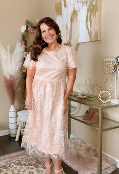 This Embroidered Mesh Fit & Flare Midi Dress is absolutely stunning! It is beautiful and soft and you will feel like the princess you are in it. Perfect for any special occasion or office or church. All eyes will be on you. 100% Poly/Rayon 0-4 Small 5-9 Medium 10-12 Large 14-16 X Large Spring A-line Dress For Mother Of The Bride, Spring A-line Dress For Confirmation, Pink Fitted Dress For Confirmation, Elegant Spring Confirmation Dresses, Feminine Lace Midi Bridesmaid Dress, Feminine Lace Midi Dress For Bridesmaids, Spring Confirmation Lace Dress, Short Sleeve Lace Confirmation Dress, Short Sleeve Lace Dress For Confirmation