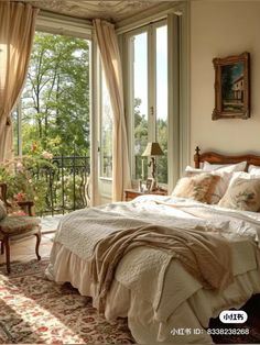 a large bed sitting in a bedroom next to a window filled with lots of windows