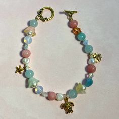 8 And A Half Inches In Length. Bead And Charm Bracelet, European Beads Bracelet, Beach Inspired Jewelry, Ocean Themed Gifts, Ocean Themed Bracelets, Bracelet Inspo Beads, Jewelry Making Aesthetic, Kathryn Core, Beaded Bracelets Aesthetic