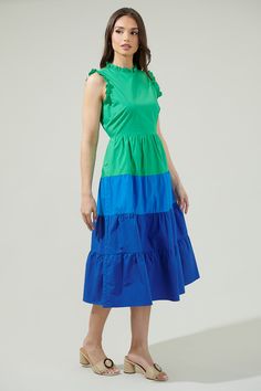 Add a pop of color to your closet with the Marilu Color Block Midi Dress! This tiered midi dress gives us beautiful blending colors that make it super pretty. It also has a sleeveless look with ruffles on the neckline and shoulders. A keyhole at back followed by a zipper. It can be paired up with green or blue heels to finish off the look! - Color block- Ruffle trim- Tiered- Pocket- Color: Blue GreenSize + Fit - Model is 5'8" and wearing size XS- Measurements taken from size S - Chest: 17 3/4"- Blue Knee-length Ruffled Sleeveless Dress, Green Sleeveless Ruffled Knee-length Dress, Multicolor Ruffled Knee-length Midi Dress, Blue Sleeveless Midi Dress With Ruffles, Green Ruffled Sundress Midi Dress, Green Sleeveless Tiered Dress, Blue Sleeveless Tiered Sundress, Blue Sleeveless Sundress Tiered Dress, Blue Sleeveless Chic Tiered Dress