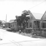 an old black and white photo of some houses