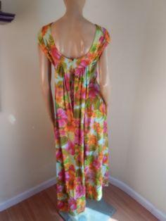 "vibrant colors!! almost neon appears never worn very rare style with interesting bodice and waterfall back appx size 7-8 measures length 52 bust 40 waist 25\" hip 44 \"lauhala\" brand made in hawaii AMazing! more hawaiiana at www.etsy.com/shop/stilettoRanch" Vibrant Green Tropical Print Maxi Dress, Colorful Floral Print Summer Maxi Dress, Multicolor Vintage Maxi Dress For Vacation, Vintage Multicolor Maxi Dress For Vacation, Retro Short Sleeve Maxi Dress For Beach, Retro Short Sleeve Maxi Dress For The Beach, Hawaiian Style Multicolor Tropical Print Dress, Multicolor Hawaiian Dress With Tropical Print, Green Hawaiian Floral Print Dress