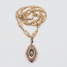 Beautiful doublé necklace with enamel medallion A pair of eyelets were renewed length 62cm material Double A beautiful antique piece of jewelry Victorian Necklace With 17 Jewels In Oval Pendant, Vintage Rose Gold Filigree Necklaces, Antique Engraved Rose Gold Necklace, Vintage Rose Gold Filigree Necklace, Heirloom Antique Gold Pendant Necklace, Ornate Oval Pendant Necklace With Vintage Charm, Gold Medallion Necklace With Vintage Charm, Antique Yellow Gold Medallion Pendant Necklace, Antique Style Yellow Gold Medallion Pendant Necklace