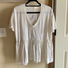 New Urban Outfitters Size Medium Truly Madly Deeply Babydoll Oversized Top Cream Color Deep V Neck Lightweight, Somewhat See Through Off White Cotton Loungewear Tops, Off White Cotton Tops For Loungewear, Off White V-neck Top For Day Out, Off White V-neck Top For Daywear, Off White Spring Loungewear Top, White Ruffled Tops For Loungewear, Casual Off-white V-neck Blouse, Oversized White V-neck Top, V-neck Ruffled Tops For Loungewear