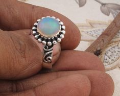 #Mother's Day gift itemsNatural Amazing Ethiopian Opal AAA+Quality Gemstone Handcrafted Ring Fire Stone Boho Ring 925-Antique Silver Middle Finger Ring L#-282955-R Stone Name - Ethiopian Opal Stone Color - White Ring Size - 5 To 14 Size Available OFFER ETSYCYBER2021ETSY ONLINE SELL 2021 TOP SELLING ITEM GIFT FOR YOU #Discover something unique #Handmade ring ''Spring Trends'' THIS ALL DESIGN IS CRATED BY SHREE JAIPUR SILVER ITS ORIGNAL DESIGN NO OTHER SITE IS SELLING THIS 2021 Spring Summer Trend Untreated Round Opal Ring As A Gift, Untreated Round Opal Ring As Gift, Untreated Round Opal Ring For Gift, Handmade Opal Ring With Round Stone As Gift, Handmade Opal Ring With Round Stone For Gift, Handmade Opal Toe Ring As Gift, Handmade Sterling Silver Opal Ring, Handmade Silver Rings With Ethiopian Opal, Silver Ethiopian Opal Rings Fine Jewelry