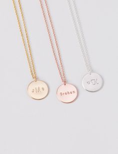 CHRISTMAS ORDER DEADLINES (WITHIN USA): Standard shipping by 12.15 Priority shipping by 12.17 Express shipping by 12.20 13mm disc necklace that can be hand-stamped on one side with your choice of initials, name, or date - endless possibilities. Modern and simple, this little piece will become a staple in your everyday jewelry collection. D E T A I L S * Disc size is approximately 13 mm * Available in 14k gold fill, sterling silver, or 14k rose gold fill * This listing is for one disc necklace P Personalized Medallion Charm Necklaces, Minimalist Round Name Charm Necklaces, Customizable Rose Gold Charm Necklaces With Round Pendant, Minimalist Round Charm Necklace With Name, Minimalist Name Charm Necklace, Customizable Rose Gold Charm Necklace With Round Pendant, Personalized Round Disc Coin Necklace Gift, Personalized Round Disc Coin Necklace For Gift, Personalized Adjustable Circle Necklace