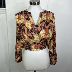 Beautiful Blouse With Fall Colors In Excellent Condition, Ties At Waist Fitted Brown Tops For Brunch, Fitted Brown Top For Brunch, Printed Brown Tops For Vacation, Brown Printed Tops For Vacation, Brown Printed Tops For Spring, Chic Beige Printed Tops, Brown Cropped Blouse For Fall, Casual Brown Cropped Blouse, Brown Floral Print Blouse For Day Out