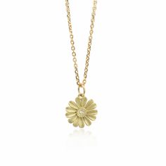 Gold Necklace - This absolutely charming daisy pendant is made in 18k gold with a diamond center; it hangs from a 14k gold chain with a lobster clasp closure. Elegant Daisy Flower Charm Jewelry, Daisy Pendant, Artful Home, Gold Pendant Necklace, Gold Pendant, Precious Metals, Gold Chain, Gold Chains, Lobster Clasp