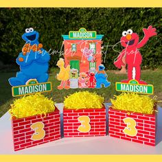 the sesame street characters are on top of each other's birthday cake box boxes