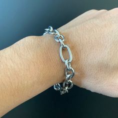 Our cable link bracelet comes in one universal size at 8" length, perfect for a loose fit. Made of 100% 316L Stainless Steel. Which will not rust, tarnish or turn green, and corrosion resistant. PRODUCT DESCRIPTION- 316L Stainless Steel, corrosion resistant, will not turn green- Strong and durable- Safe in water, shower safe. Sizing- 10mm wide- 8" Length SHIPPING- Free Shipping in the United States When You Order Now!- Worldwide shipping availableAll orders come with one quantity unless otherwis Chunky Stainless Steel Bracelet With Rectangular Links, Modern Stainless Steel Bracelet With Chunky Chain, Silver Cable Chain Metal Bracelets, Oval Link Stainless Steel Bracelets With Cable Chain, Stainless Steel Bracelets With Oval Link Cable Chain, Metal Cable Chain Link Bracelets, Silver Stainless Steel Bracelet With Cable Chain, Silver Stainless Steel Cable Chain Bracelet, Minimalist Stainless Steel Bracelet With Chunky Chain