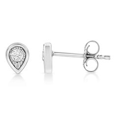 These pear shaped stud earrings are crafted in .925 sterling silver and feature 1/10ct TDW of diamonds. Each earring features a single sparkling round cut diamond in a miracle setting that adds to the earrings' sparkle. A polished silver halo creates a frame around the earring. These studs secure with a push back mechanism. Pear-shaped White Gold Diamond Earrings With Accents, Pear-shaped Diamond Earrings With Single Cut For Anniversary, Anniversary Pear-shaped Single Cut Diamond Earrings, White Gold Teardrop Diamond Earrings With Single Cut Diamonds, Pear-shaped Diamond White Diamond Earrings For Anniversary, Brilliant Cut Pear-shaped Sterling Silver Diamond Earrings, Sterling Silver Teardrop Diamond Earrings With Single Cut, Gift Sterling Silver Brilliant Cut Teardrop Earrings, Brilliant Cut Teardrop Earrings In Sterling Silver As Gift