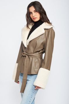 Introducing the Penny Girl Sherpa Jacket, a 70s-inspired masterpiece made from premium vegan leather. Featuring a luxurious Sherpa trim and a stylish belt tie closure, this jacket offers a timeless and sophisticated look that will keep you warm and fashionable. Upgrade your wardrobe with this stylish and cruelty-free statement piece. SIZE & FIT :MODEL WEARS SIZE SMALLMODEL'S HEIGHT 5'9 Made In: IMPORTED Fabric Contents: 55% POLYESTER, 45% POLYURETHANE Leather Jacket With Belt, Outwear Fashion, Fur Leather Jacket, Trim Jacket, Vegan Leather Jacket, Leather Denim, Belted Jacket, Cozy Fits, Faux Leather Jacket